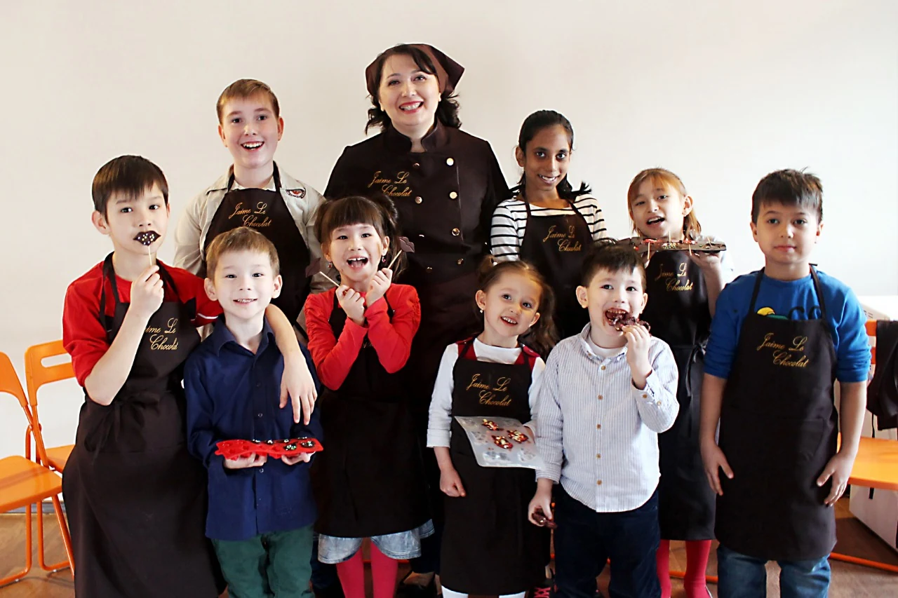 Liliya leading a chocolate workshop for children